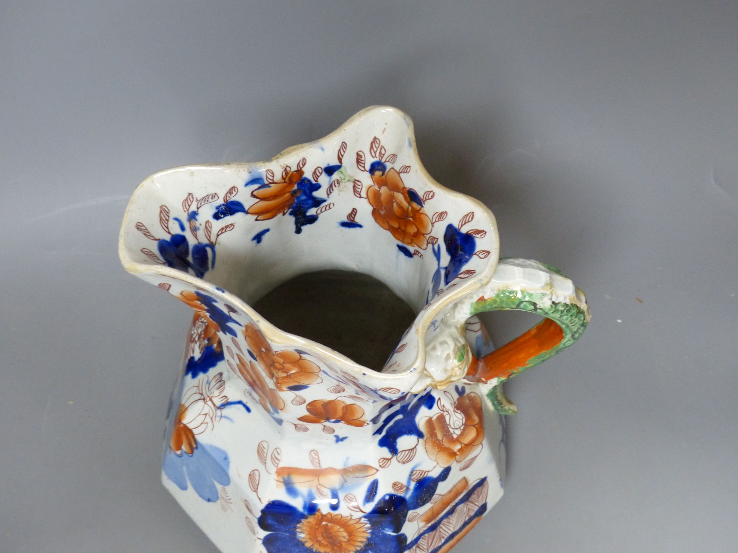 A 19th century ironstone jug, height 24cm